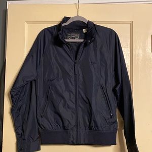 Levi’s Men’s black nylon lined jacket, size small with ribbed waist, snap cuffs.